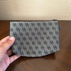 Dooney & Bourke small make up bag. New.